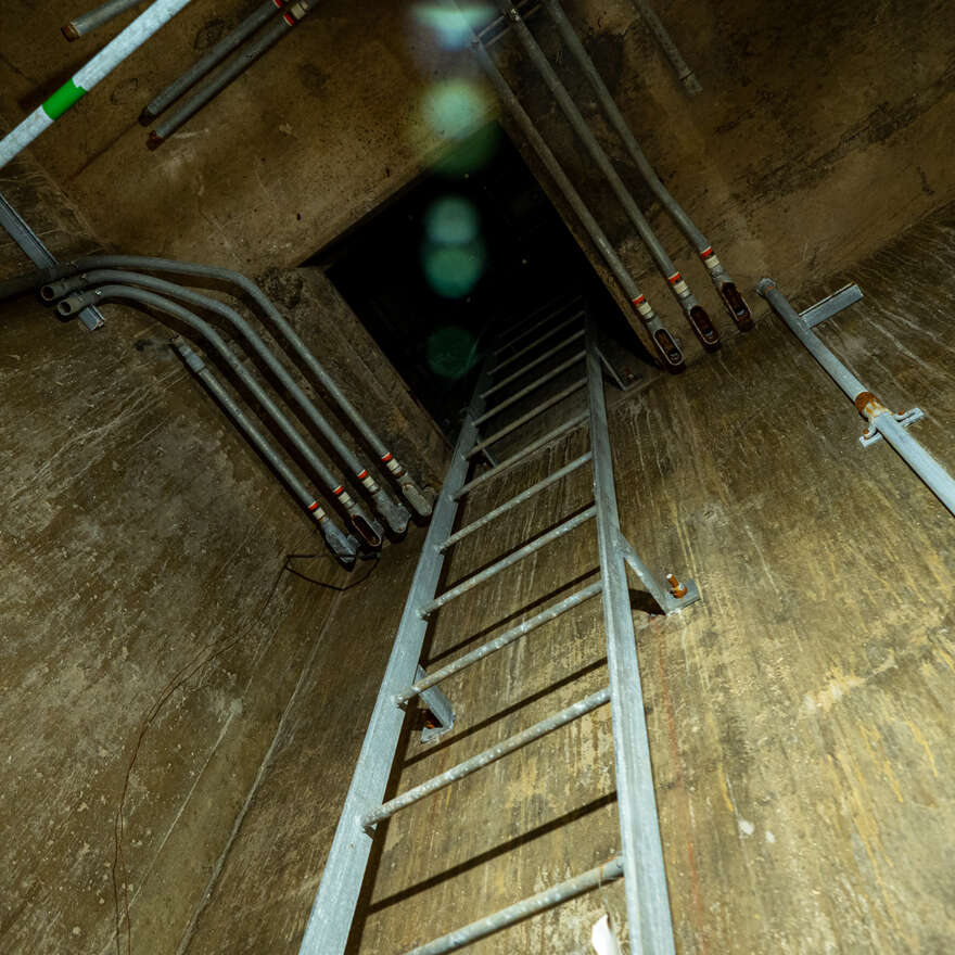 An emergency escape hatch in the underground bunker.